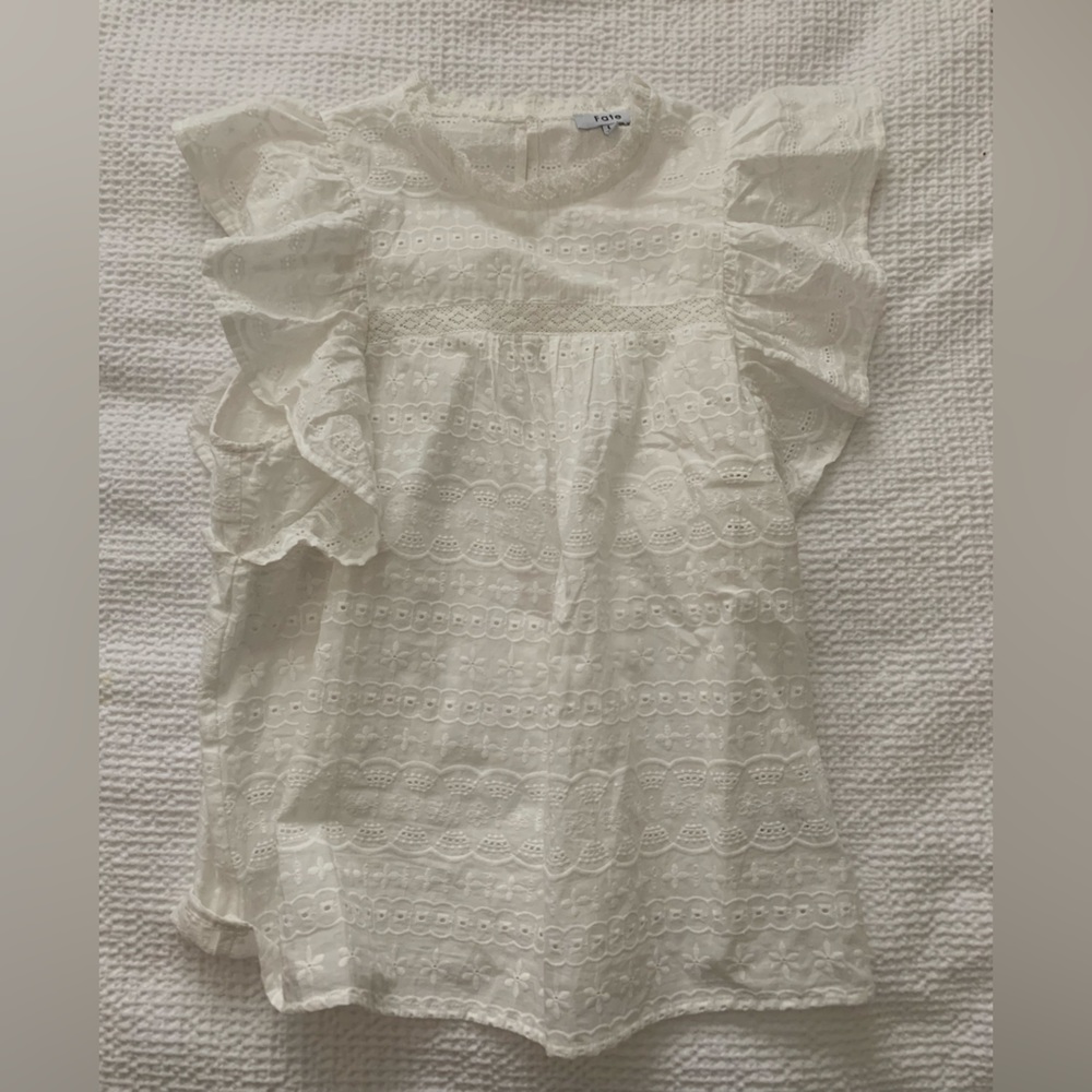 White eyelet top with ruffle sleeves